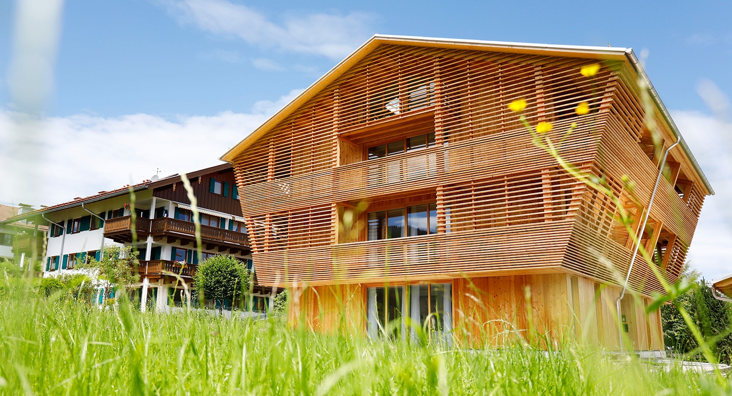 Ferienwohnungen (Aparthotel) in Holzbauweise – Neubau eines Ferienhauses